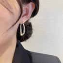 Korsformade örhängen