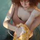 Afrikansk exfolierande mesh-badhandduk med hög elasticitet