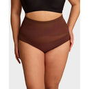 Plus size-trosor med hög midja och korsade former