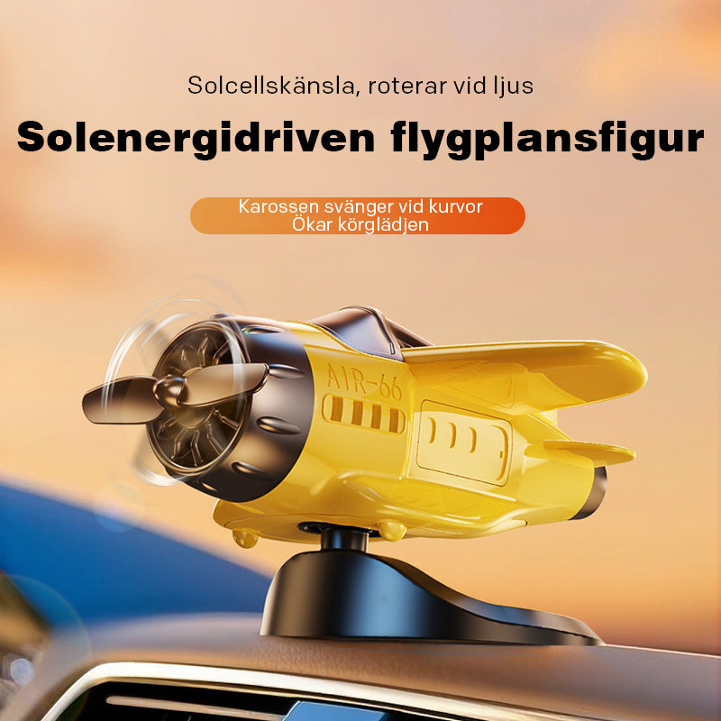 Solcellsdrivna roterande flygplansprydnader för instrumentbrädans tillbehör i bilens interiör