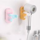 Hållare för hårtork med sugkopp