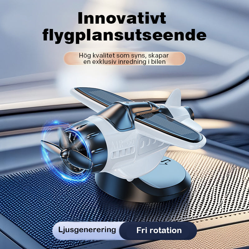Solcellsdrivna roterande flygplansprydnader för instrumentbrädans tillbehör i bilens interiör