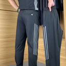 Herrset med kortärmade långbyxor och casual sportbyxor i två delar