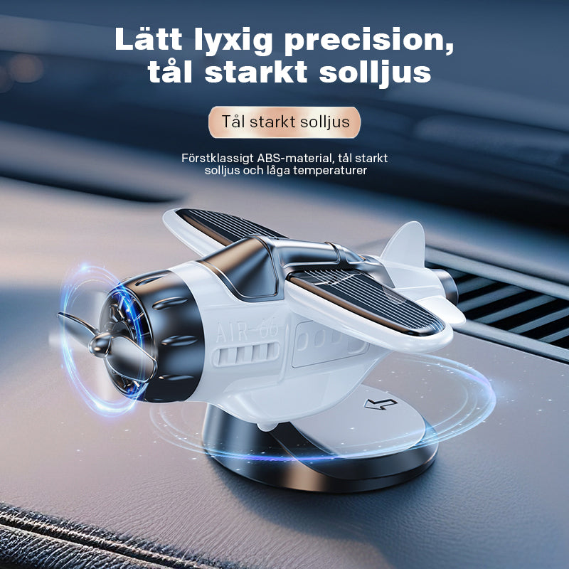 Solcellsdrivna roterande flygplansprydnader för instrumentbrädans tillbehör i bilens interiör