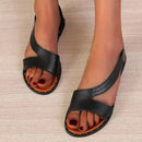 Platta sandaler med fiskmunn och öppen tå