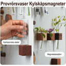 Flytande väggmonterad rörformad vas