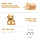 Charmig liten gungfigur i trä med 12 magnetiska uttryck