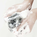 Exfolierande antibakteriell badhandduk