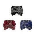 Mönstrat yoga-huvudband med kors