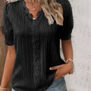 Elegant skjorta med V-ringning i enfärgad spets