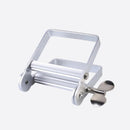 Tandkrämspressare i metall