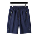 Snabbtorkande sportshorts för män