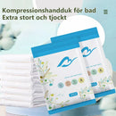 Komprimerad badhandduk