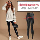 LEGGINGS I ELASTISKT LÄDER