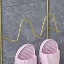 Väggmonterad självhäftande toffelhållare