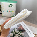 Komprimerad badhandduk