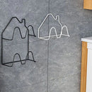 Väggmonterad självhäftande toffelhållare