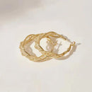 Cirkulära örhängen med zirkonia